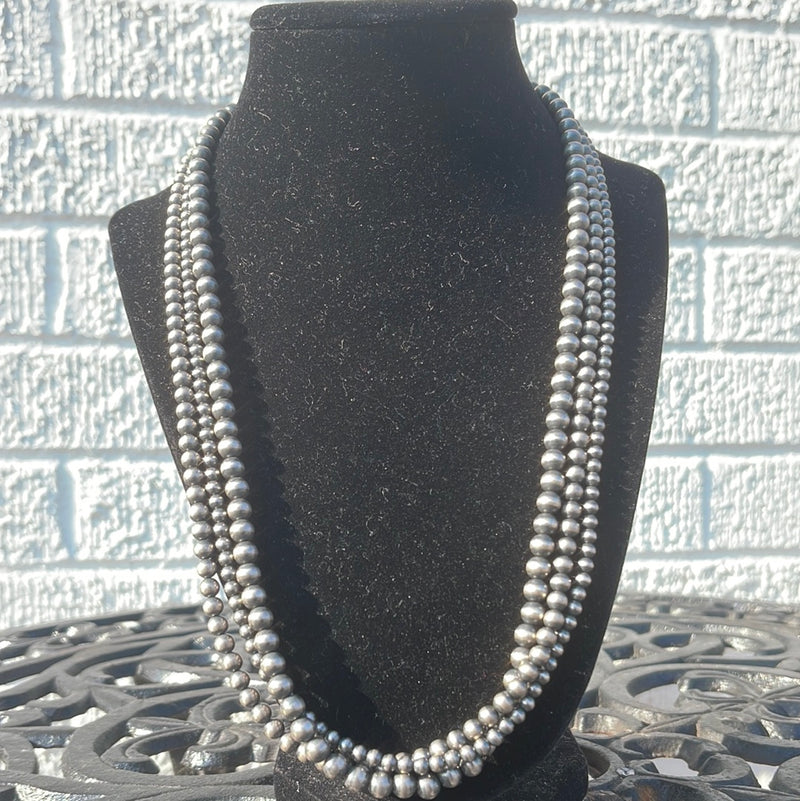 Triple strand navajo pearls