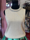 Sleeveless Knit Top With Embellished Neckline