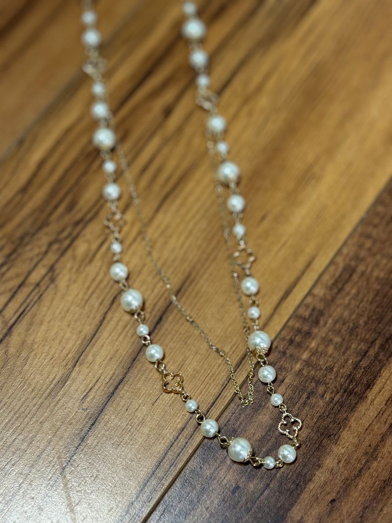 Double strand pearl and gold necklace